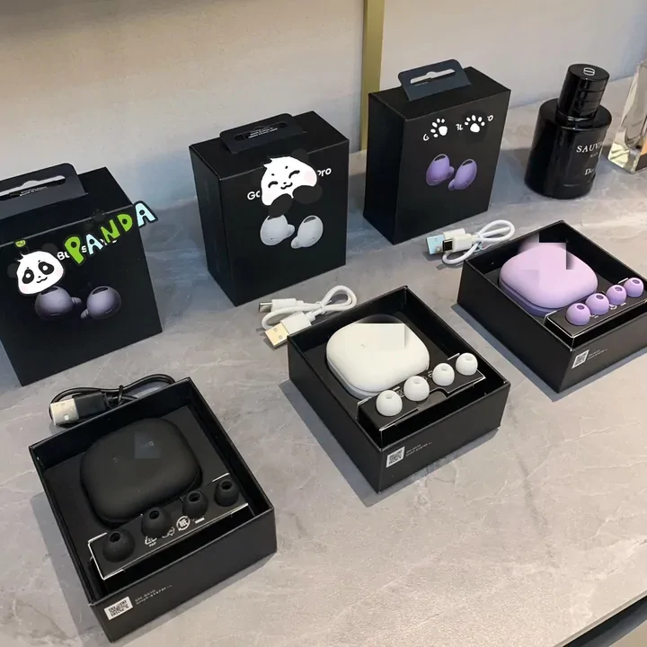 Boxed wireless earbuds displayed on a table